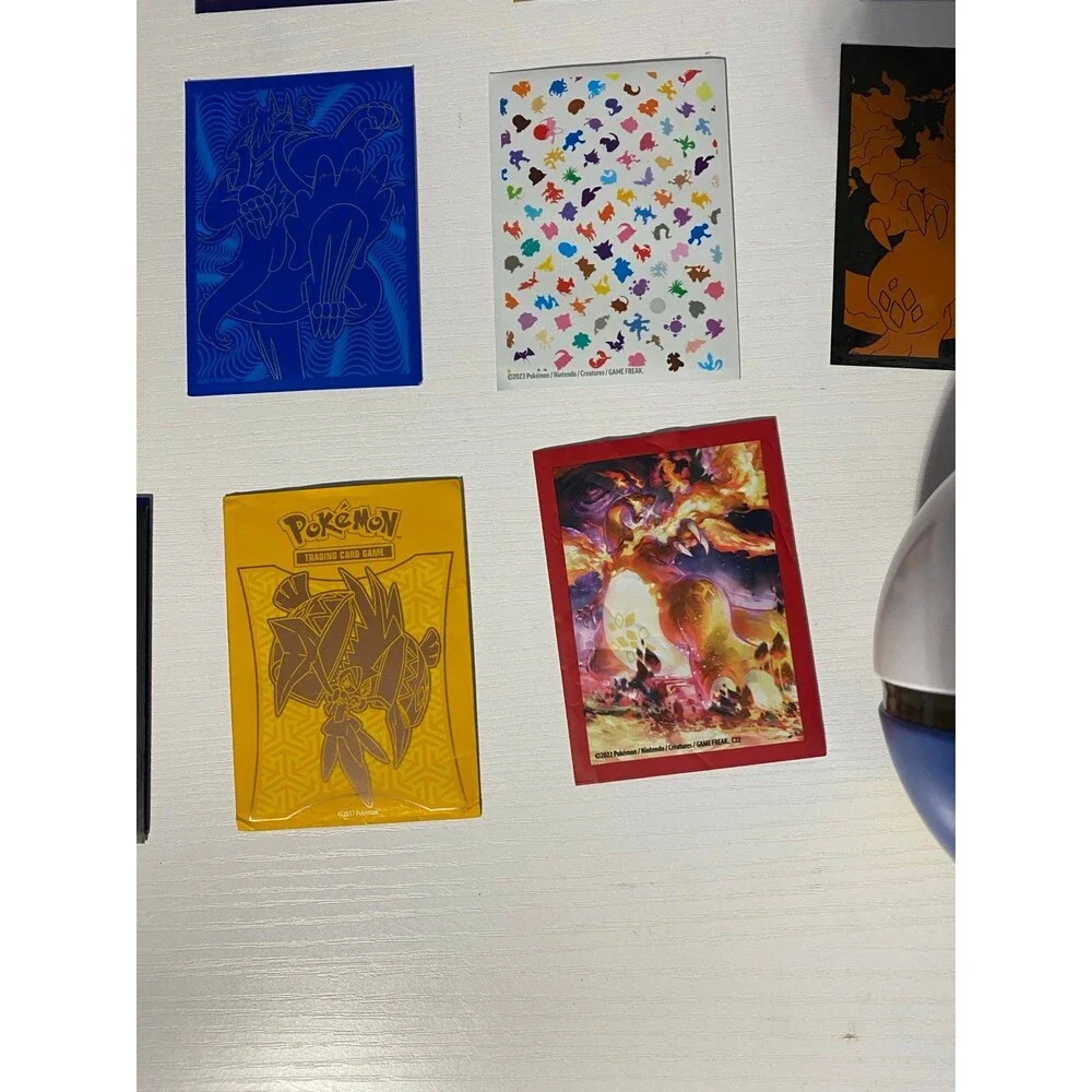 Pokemon Empty Quick Ball Tin Blue Gold with 11 Mixed Trading Card Sleeves Lot